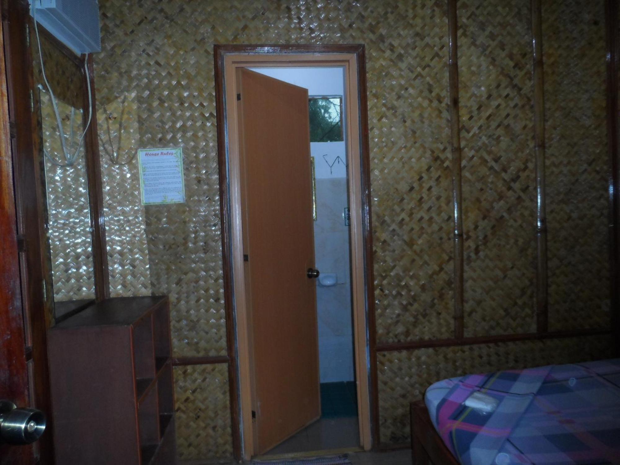 Victoria Guest House And Cottages Puerto Princesa Quarto foto