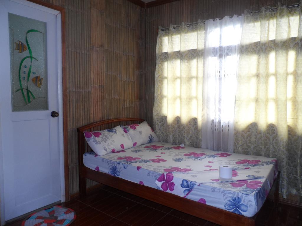 Victoria Guest House And Cottages Puerto Princesa Quarto foto